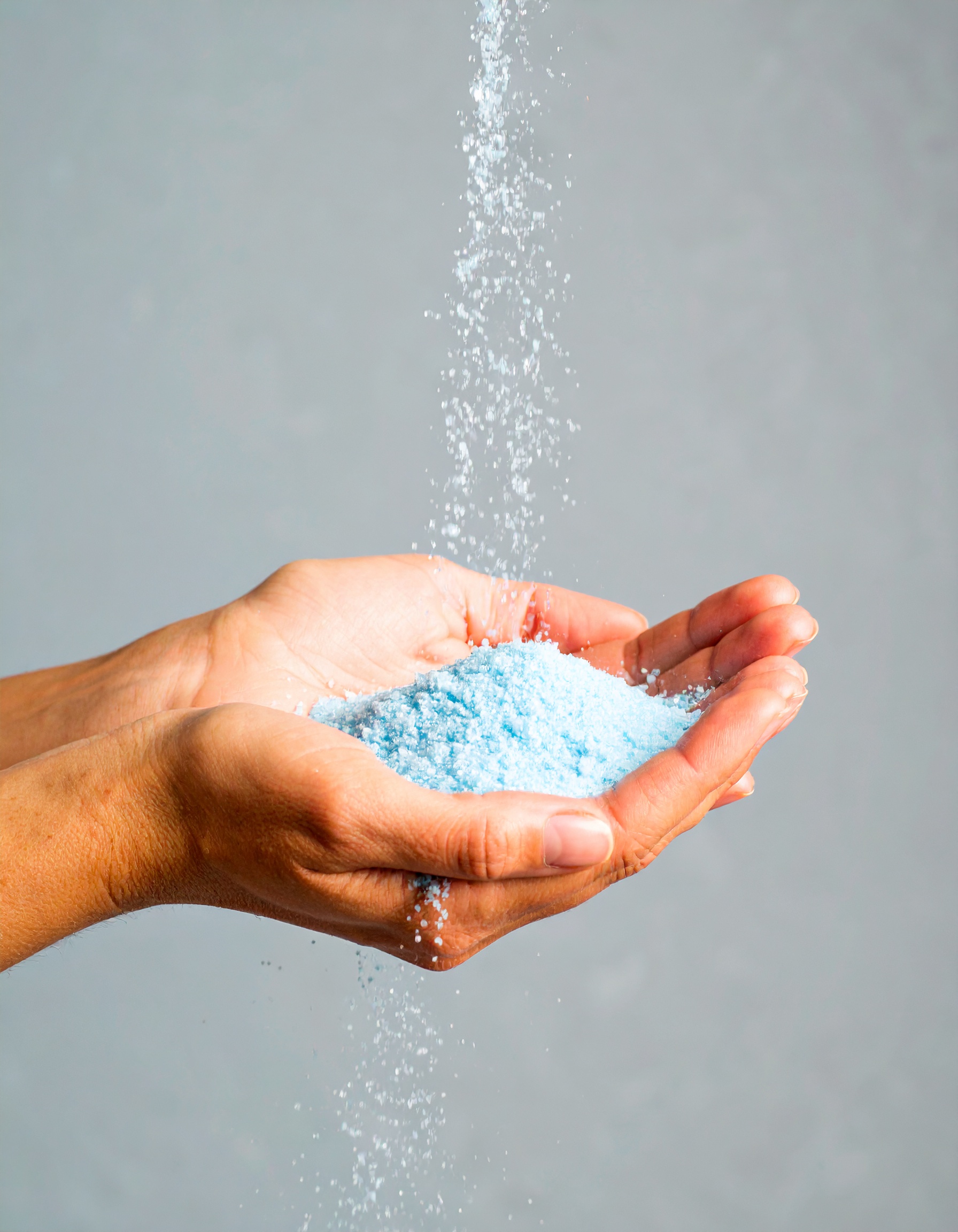 Firefly_woman using blue soap powder, blue studio background 954047